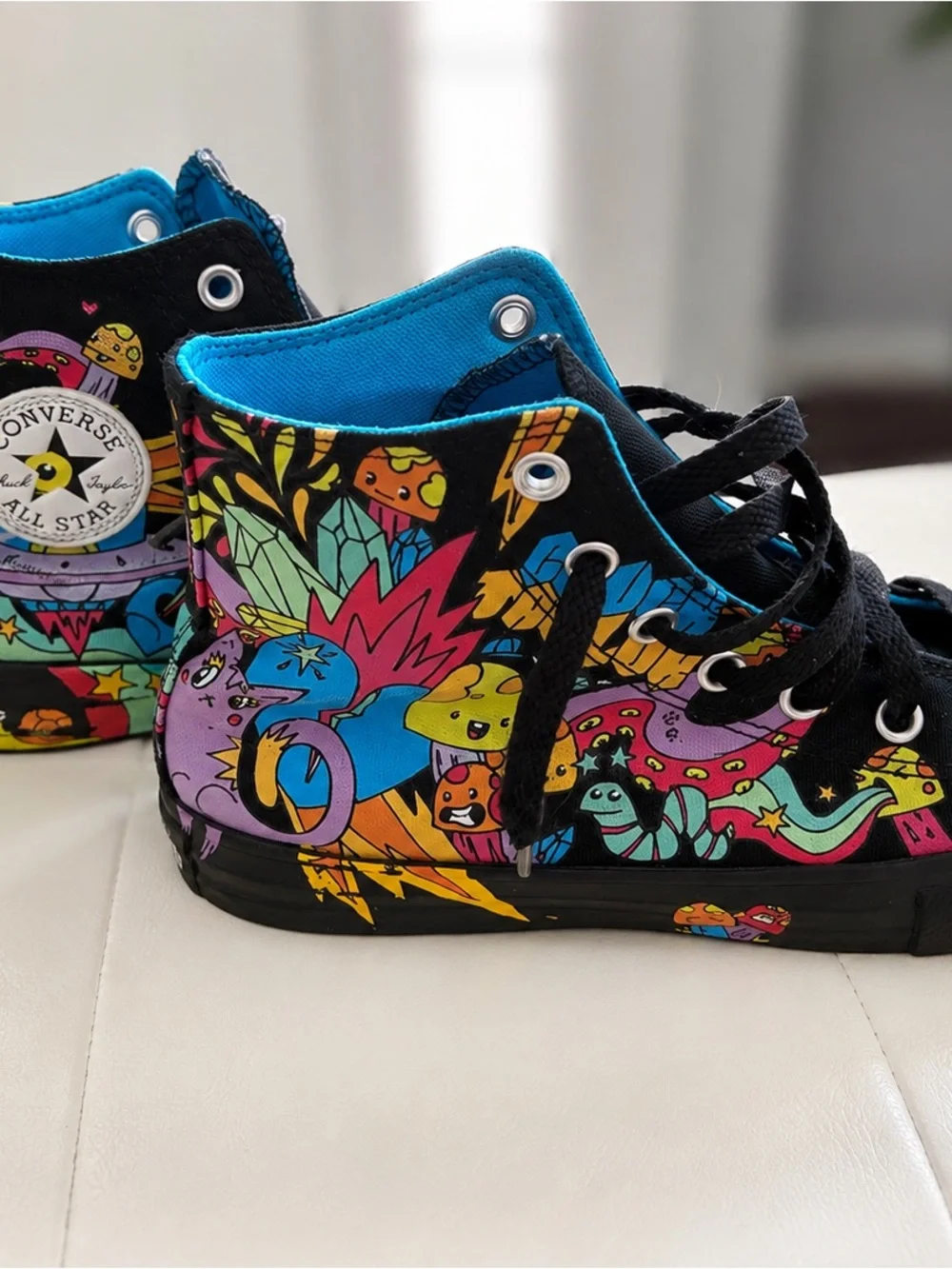 Converse Kids High Top Sneakers in Black with Multicolor Cartoon Graphic